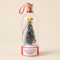 Merry Message recordable Christmas message bottle with snowy tree, gold star and red label